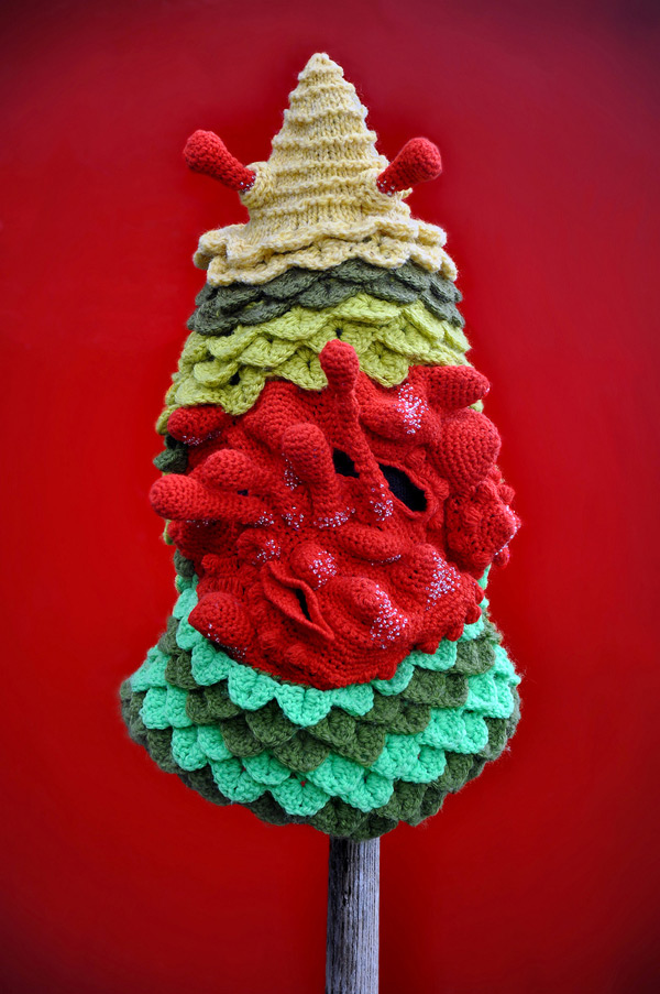 Knitting masks by artist Tracy Widdess